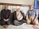 دیدار نماینده ولی فقیه در کردستان و مدیرکل بنیاد شهید استان با خانواده شهدای جنگ رمضان بانه